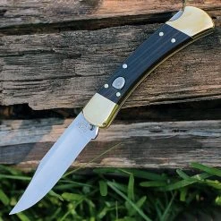 Buck Knives Buck 110BRSA Automatic Hunter, 3.75" 420HC SS Plain Blade, Ebony Dymondwood Handle