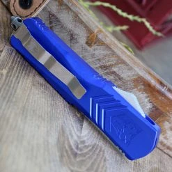 CobraTec Blue FS-X OTF Knife CTKLBLUFS-XLDAG1SS, 3.75" D2 Steel Dagger Serrated Blade, Blue Aluminum Handle 7 CobraTec Blue FS-X OTF Knife CTKLBLUFS-XLDAG1SS, 3.75" D2 Steel Dagger Serrated Blade, Blue Aluminum Handle -Boker Shop CTKLBLUFSX 79116.1583333732